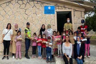 Şehit eşi ve gençlerden köy okulu öğrencilerine yardım