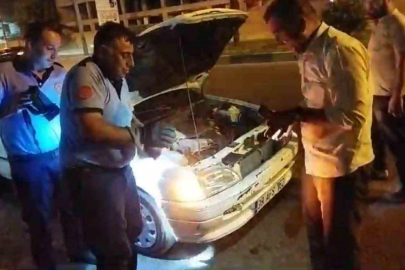 Otomobilin motoruna giren kediyi itfaiye çıkardı